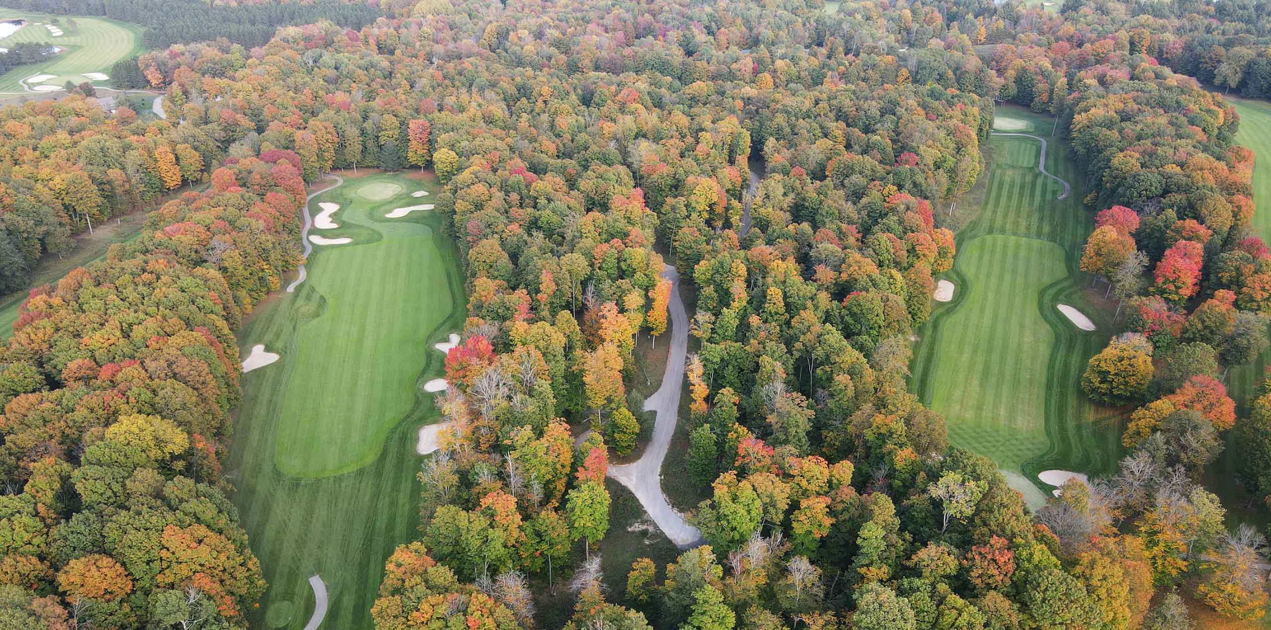 golf course fall colors drone view